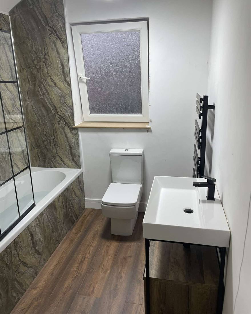 Cloakroom WC and basin with black fittings